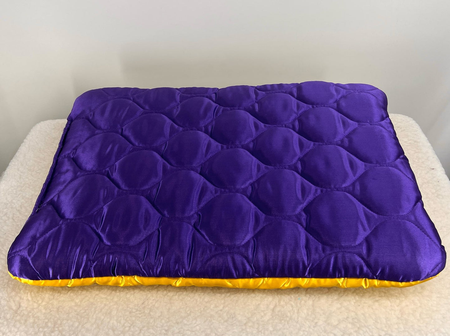 Purple and Yellow Specialty Beds and Donuts