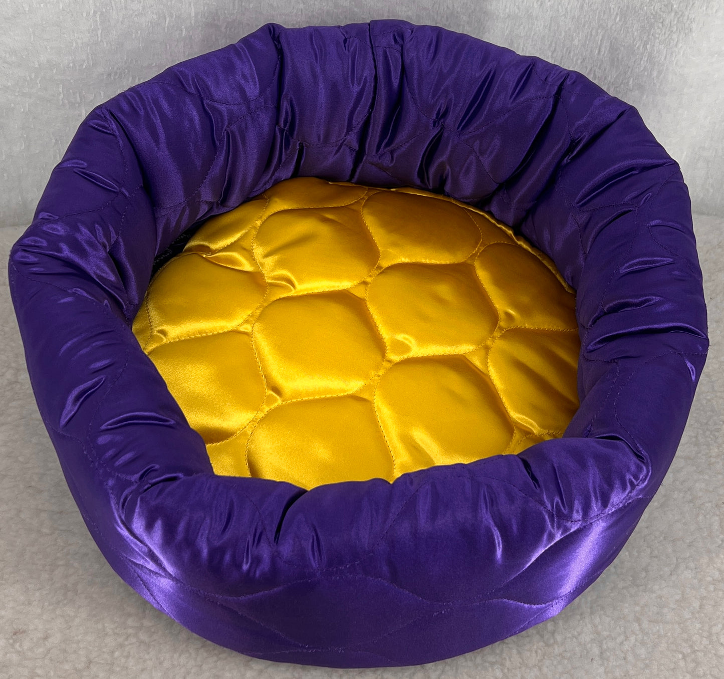 Purple and Yellow Specialty Beds and Donuts