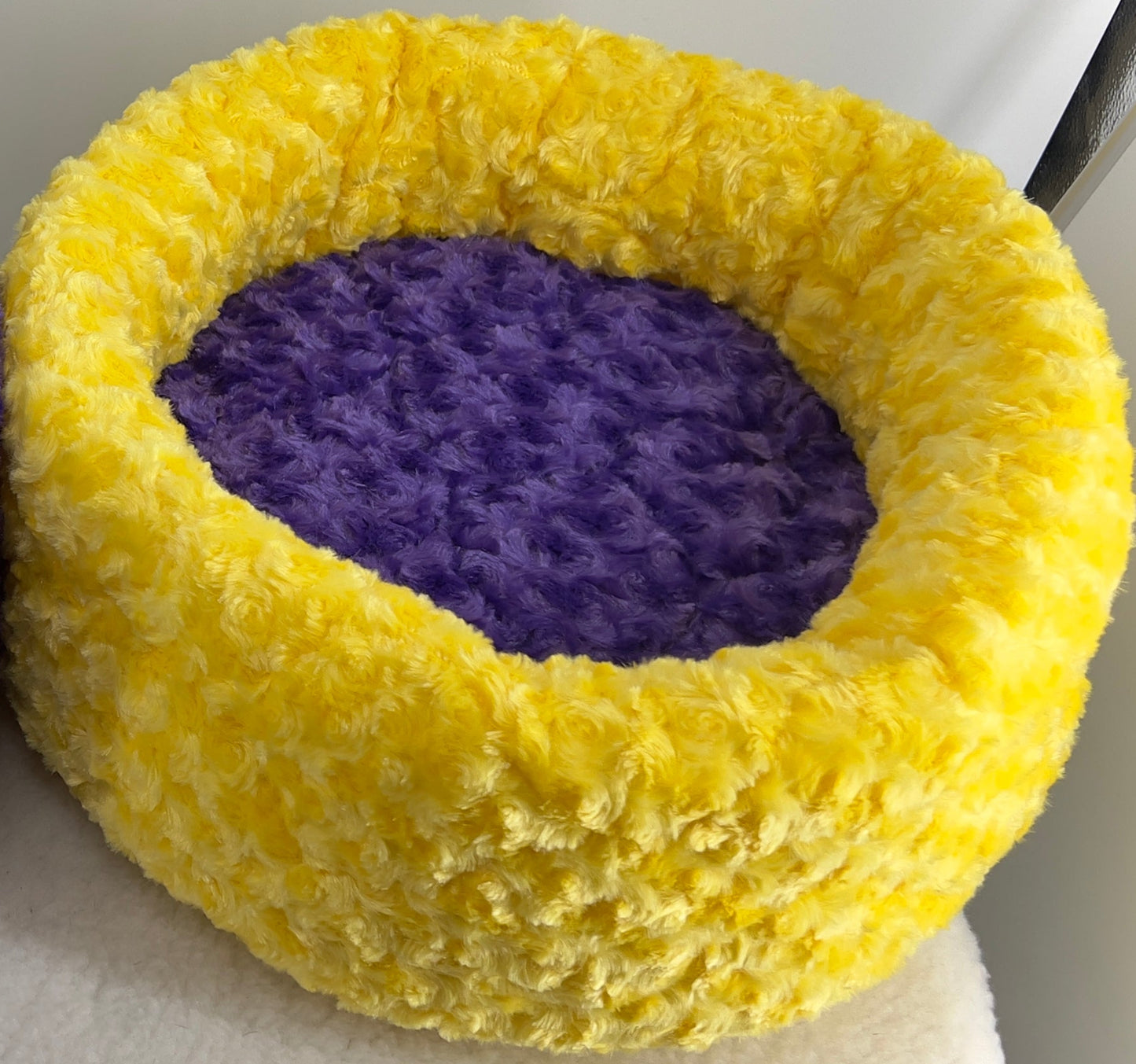 Purple and Yellow Specialty Beds and Donuts