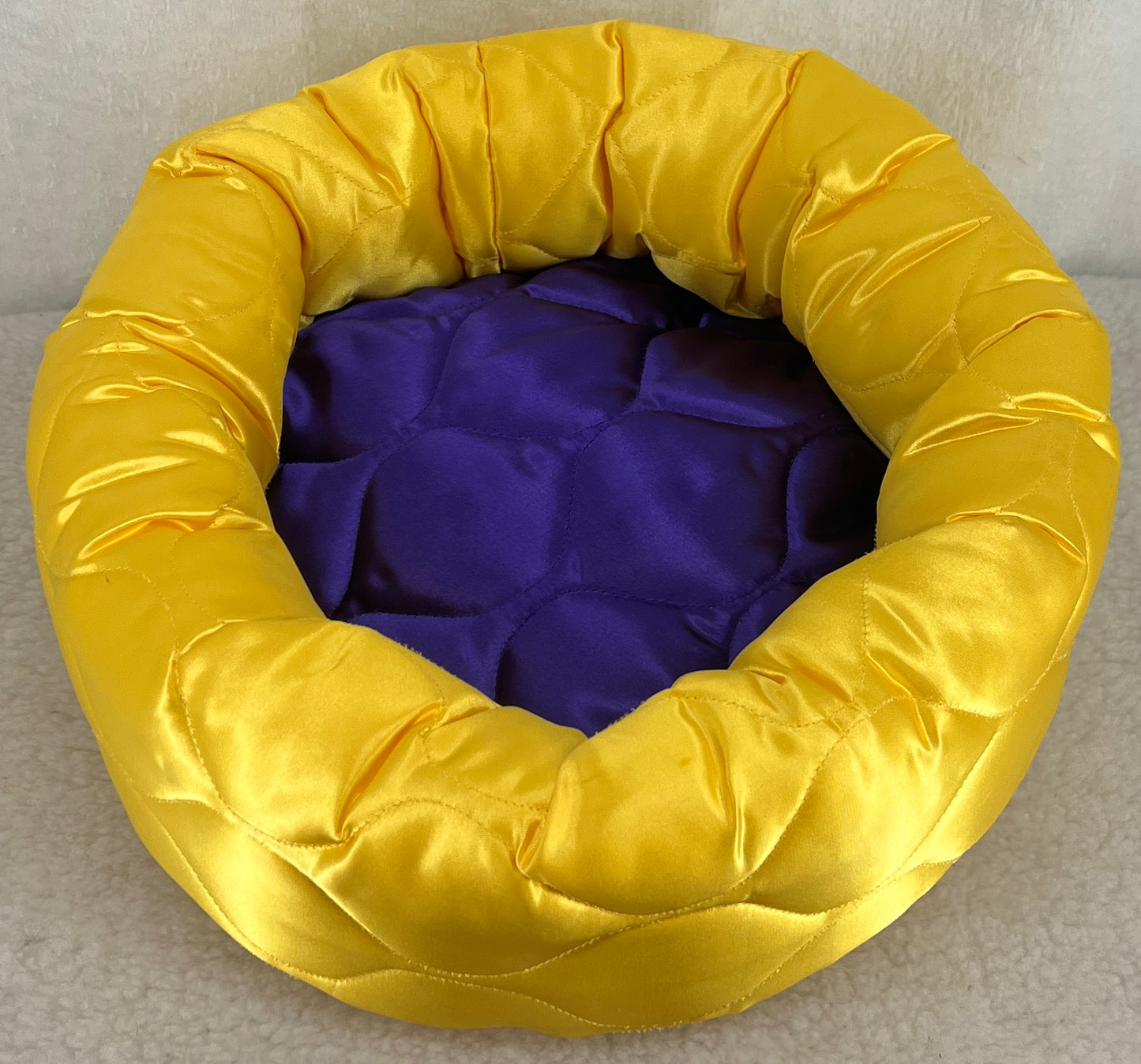 Purple and Yellow Specialty Beds and Donuts