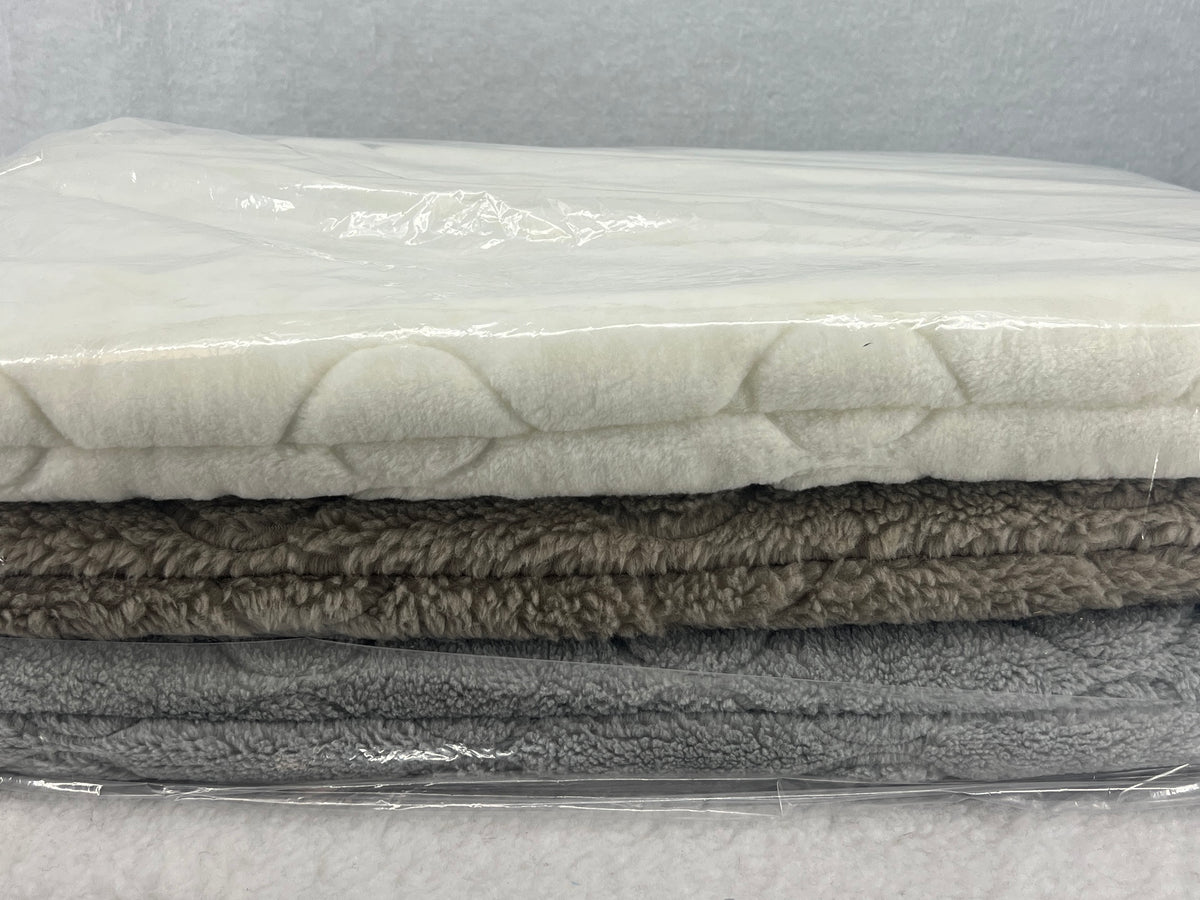 FMS Dog Beds packs of beds designed to fit RuffLand™ Performance Kennels, showing plush, durable bedding inside kennel cages.