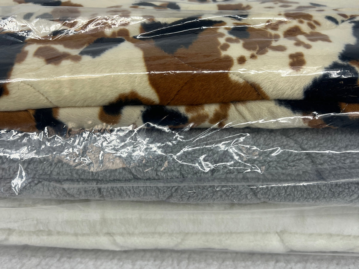 FMS Dog Beds packs of beds designed to fit RuffLand™ Performance Kennels, showing soft, durable bedding inside the kennels.